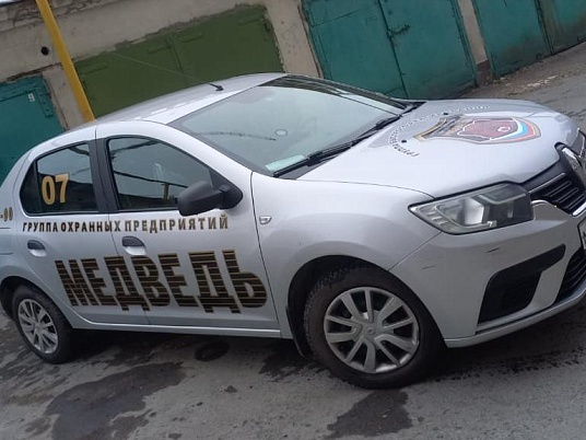 Реклама на автомобиль частного охранного предприятия